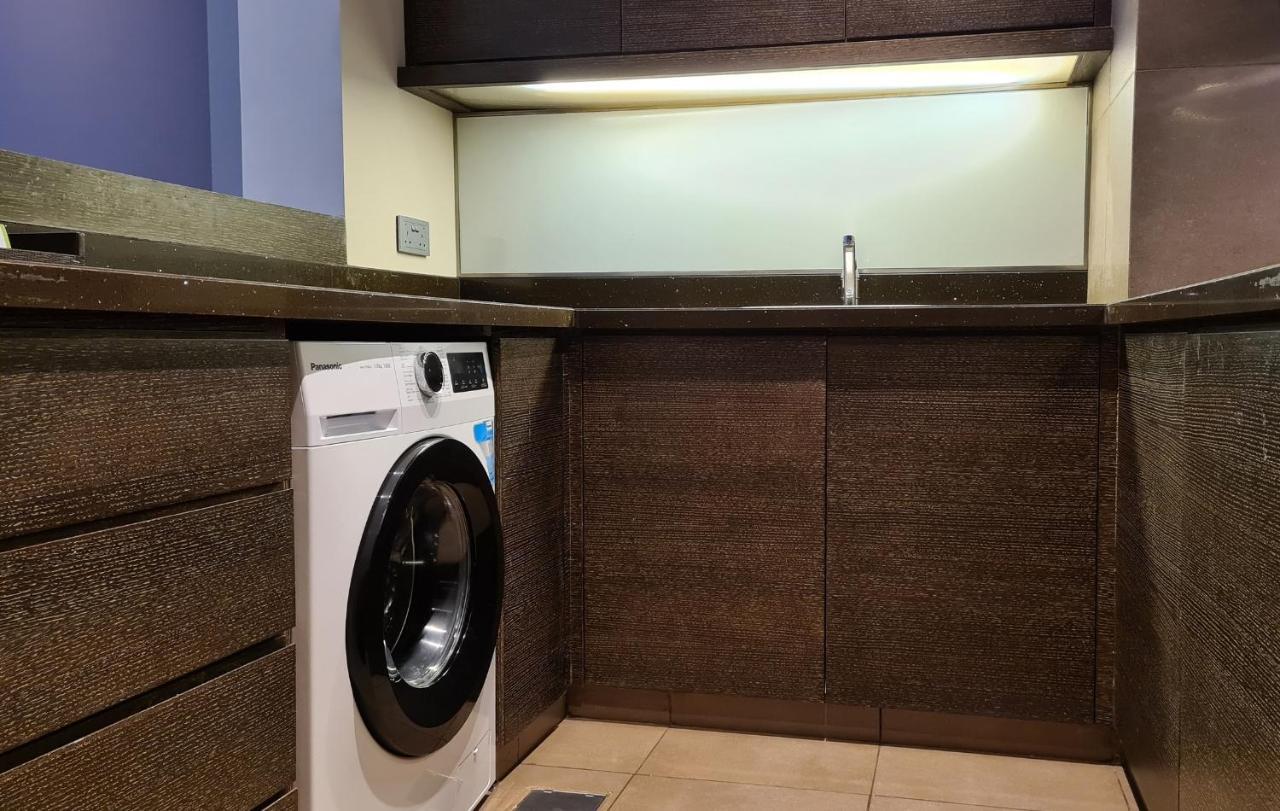 Four Points By Sheraton Αλ Άϊν Εξωτερικό φωτογραφία A laundry room